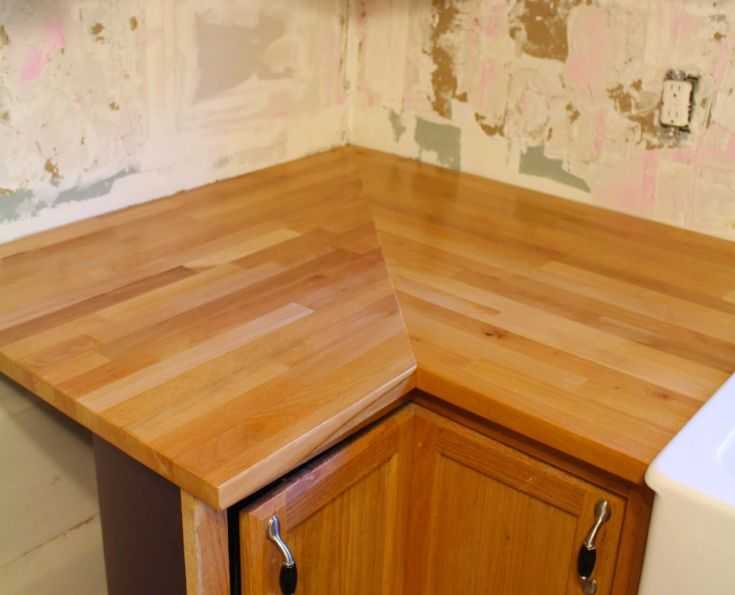 Установка столешницы на кухне своими руками: монтаж кухонного гарнитура